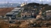 Chiến đấu cơ Israel đánh trường học có khu nhà của Hamas, có tin 27 người chết